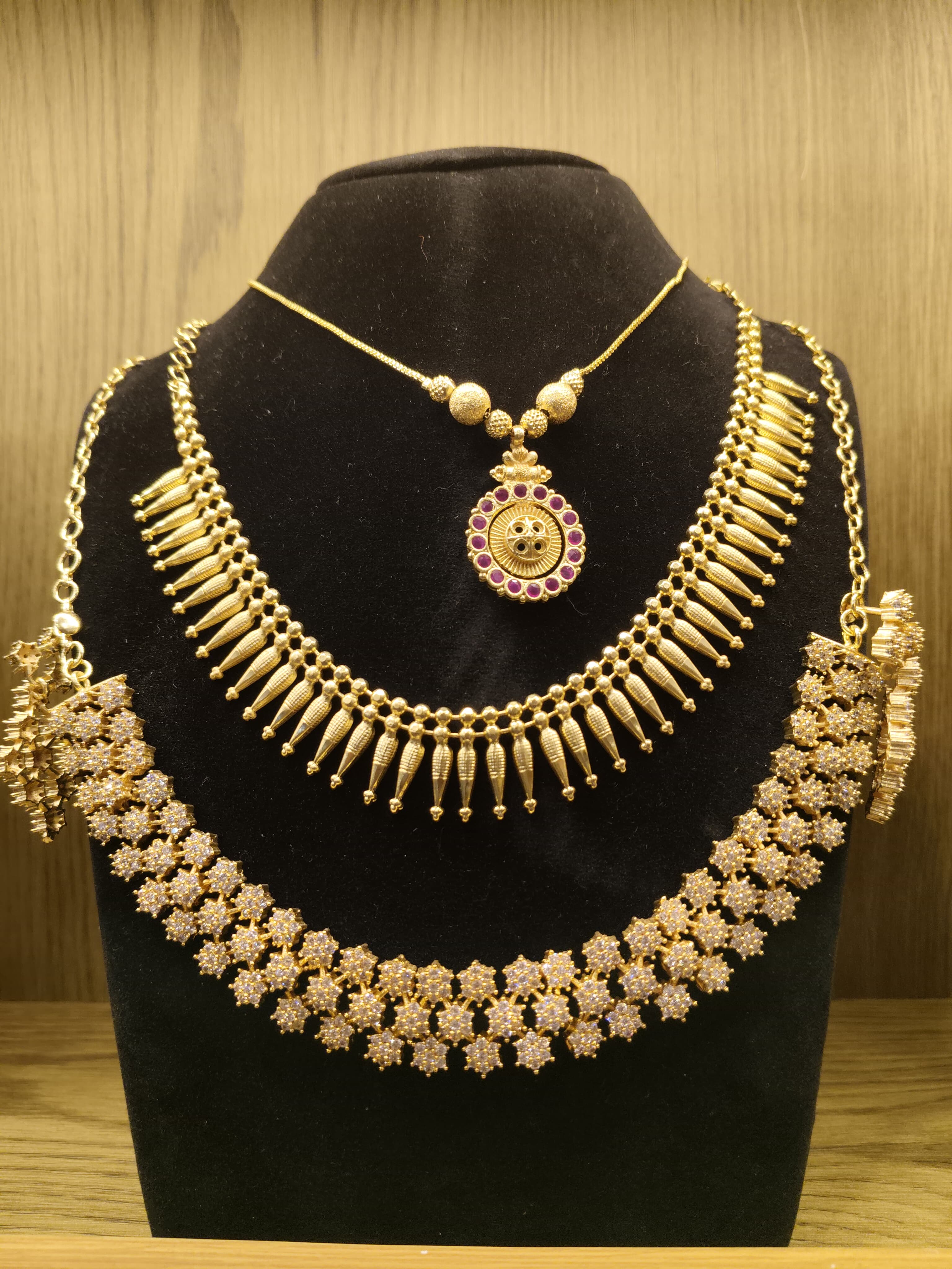 A One Gold Covering Kunnumpuram